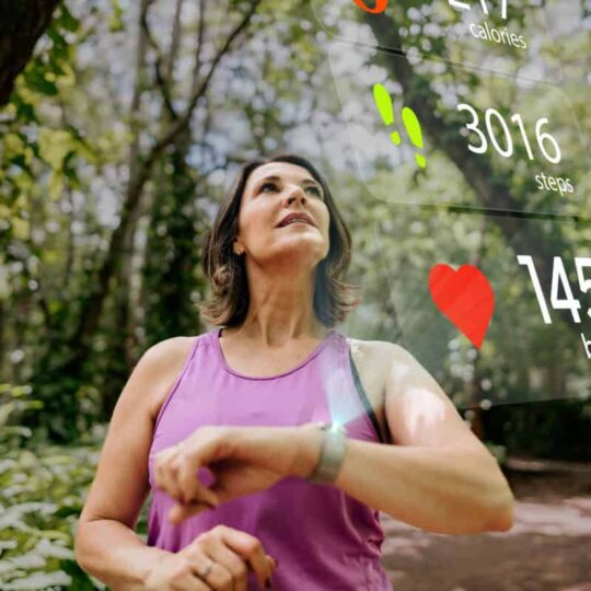 runner checks her biodata on smartwatch